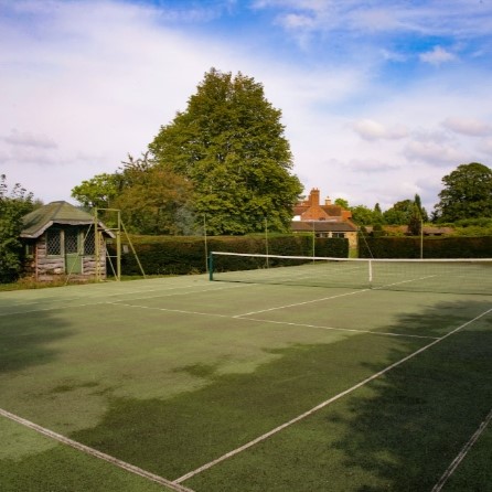 Tennis court at Great Tangley Manor House